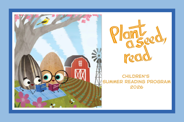 Egg and Seed reading a book on a blue blanket with a red barn in the background.