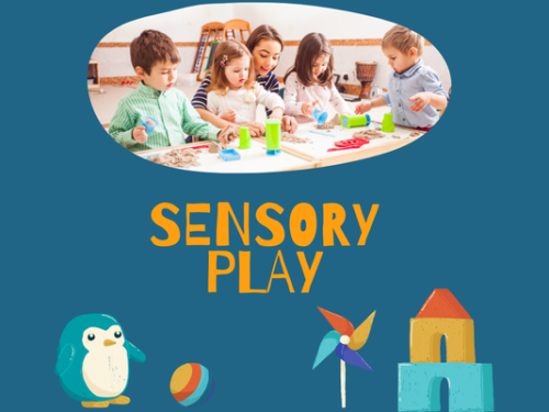 kids at a table playing with sensory items and a penguin near ball with a windmill and block castle